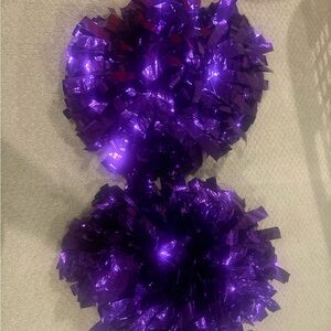 Girls purple pom poms